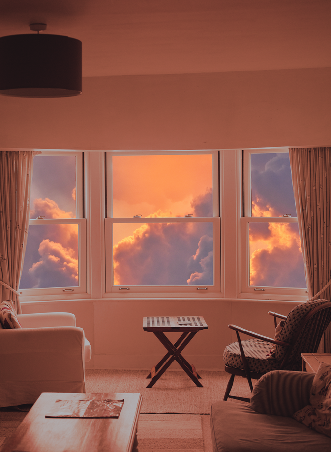 A Photoshopped room with a view of clouds